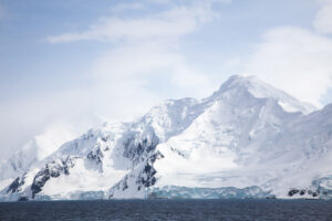 Snowcapped Peaks on the Antarctic Coast